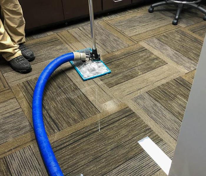 state-of-the-art portable extraction units to remove the water from the carpets. 